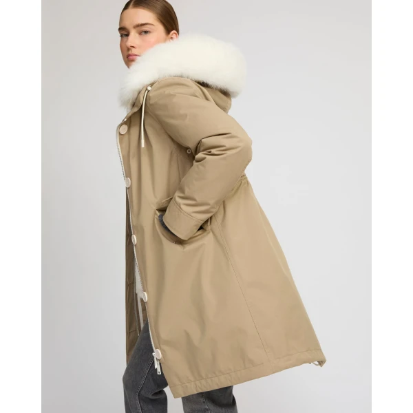 Woman wearing Yves Salomon shearling fur coat – luxury outerwear at Luxury Shoes 