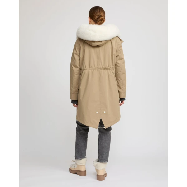 Woman wearing Yves Salomon shearling fur coat – luxury outerwear at Luxury Shoes 