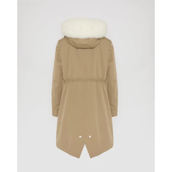 Woman wearing Yves Salomon shearling fur coat – luxury outerwear at Luxury Shoes 