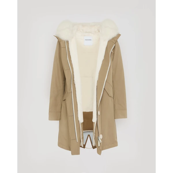 Woman wearing Yves Salomon shearling fur coat – luxury outerwear at Luxury Shoes 
