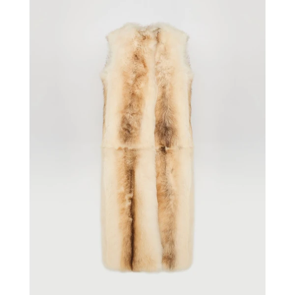 Woman wearing Yves Salomon shearling fur coat – luxury outerwear at Luxury Shoes 