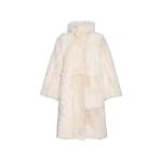 Woman wearing Yves Salomon shearling fur coat – luxury outerwear at Luxury Shoes 