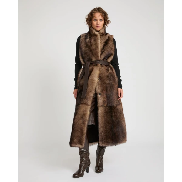 Woman wearing Yves Salomon shearling fur coat – luxury outerwear at Luxury Shoes 