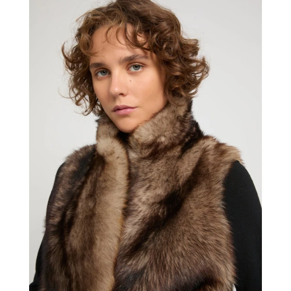 Woman wearing Yves Salomon shearling fur coat – luxury outerwear at Luxury Shoes 