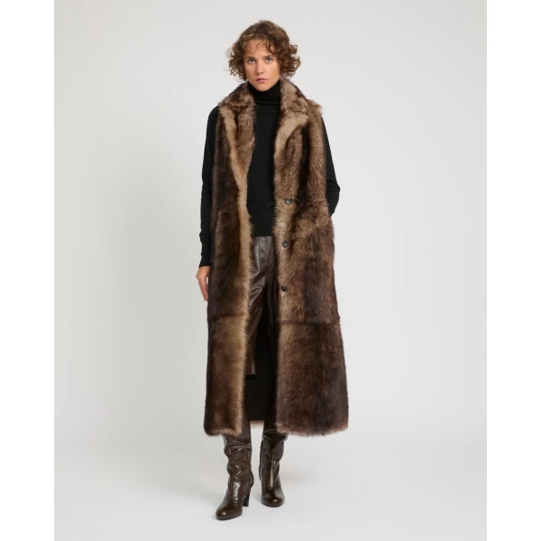 Woman wearing Yves Salomon shearling fur coat – luxury outerwear at Luxury Shoes 