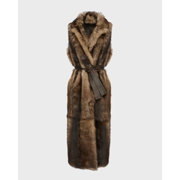 Woman wearing Yves Salomon shearling fur coat – luxury outerwear at Luxury Shoes 