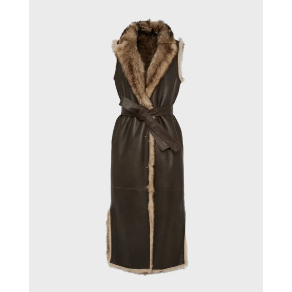 Woman wearing Yves Salomon shearling fur coat – luxury outerwear at Luxury Shoes 