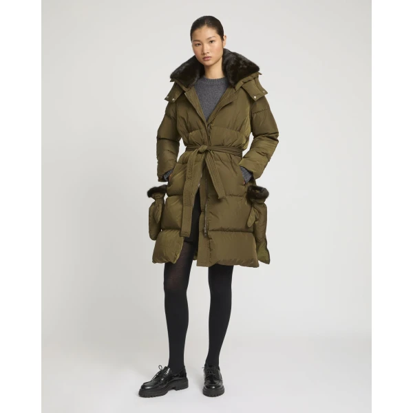 Woman wearing Yves Salomon shearling fur coat – luxury outerwear at Luxury Shoes 