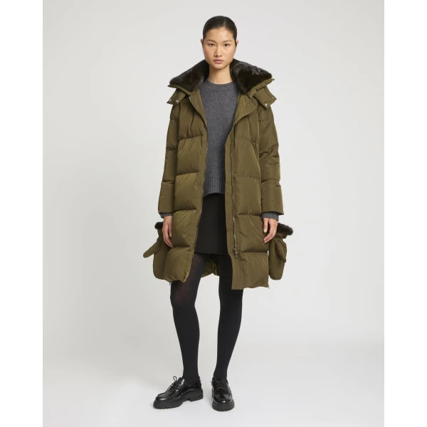 Woman wearing Yves Salomon shearling fur coat – luxury outerwear at Luxury Shoes 