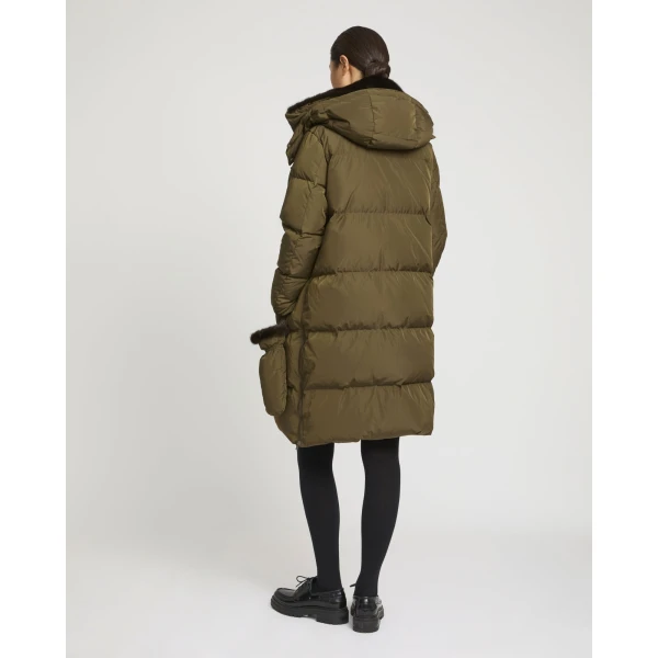Woman wearing Yves Salomon shearling fur coat – luxury outerwear at Luxury Shoes 