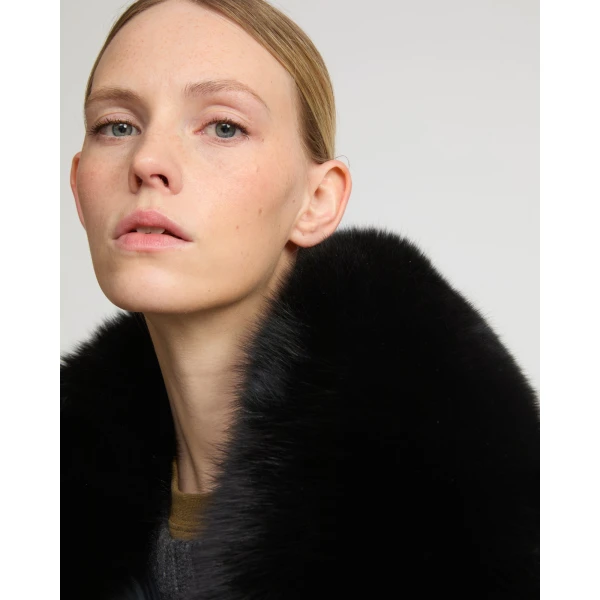 Woman wearing Yves Salomon shearling fur coat – luxury outerwear at Luxury Shoes 