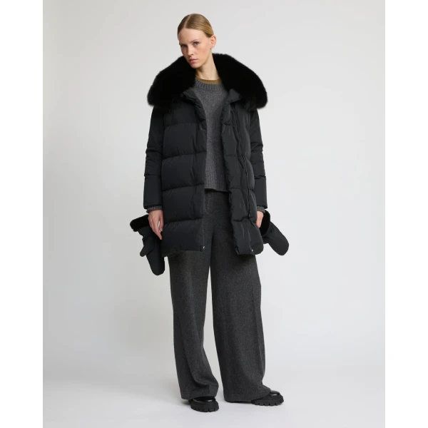 Woman wearing Yves Salomon shearling fur coat – luxury outerwear at Luxury Shoes 