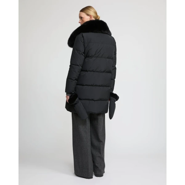Woman wearing Yves Salomon shearling fur coat – luxury outerwear at Luxury Shoes 