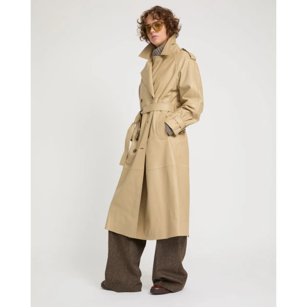 Woman wearing Yves Salomon shearling fur coat – luxury outerwear at Luxury Shoes 