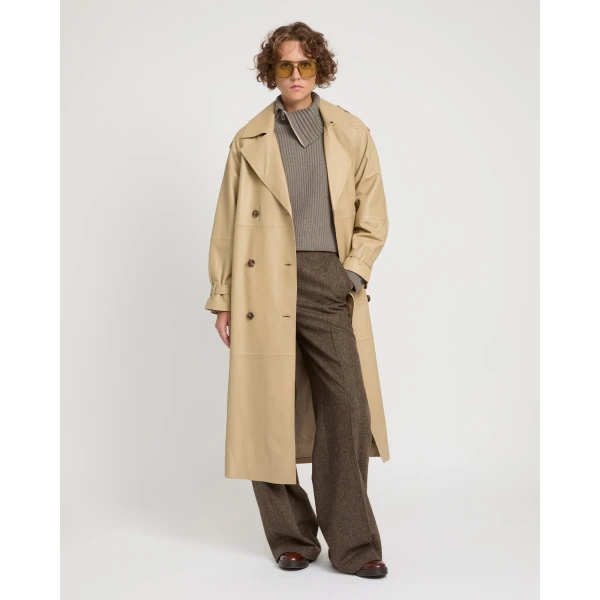 Woman wearing Yves Salomon shearling fur coat – luxury outerwear at Luxury Shoes 