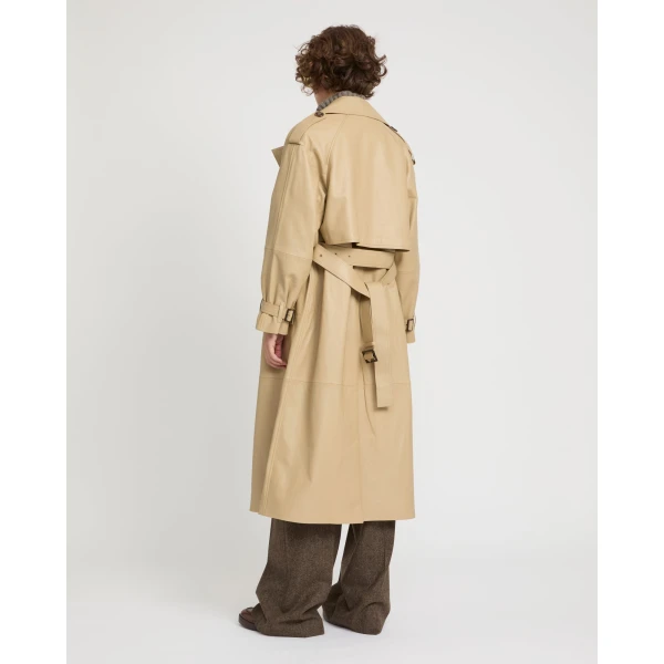 Woman wearing Yves Salomon shearling fur coat – luxury outerwear at Luxury Shoes 