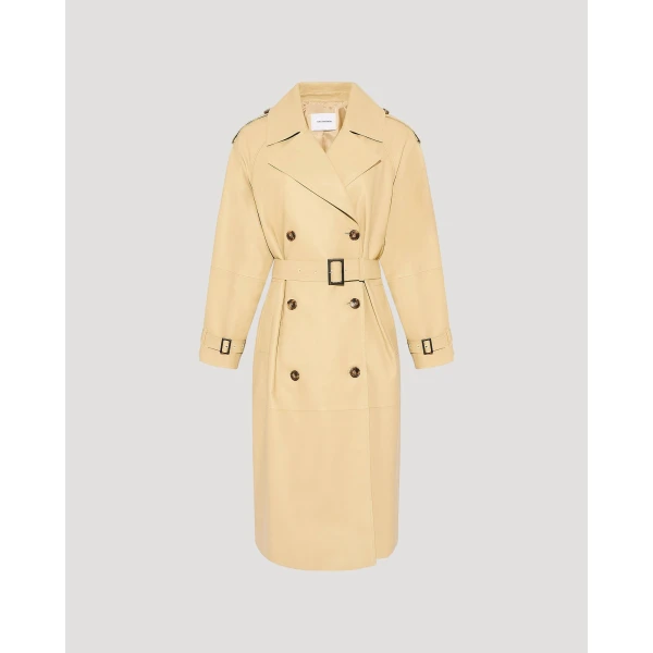 Woman wearing Yves Salomon shearling fur coat – luxury outerwear at Luxury Shoes 