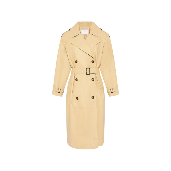 Woman wearing Yves Salomon shearling fur coat – luxury outerwear at Luxury Shoes 