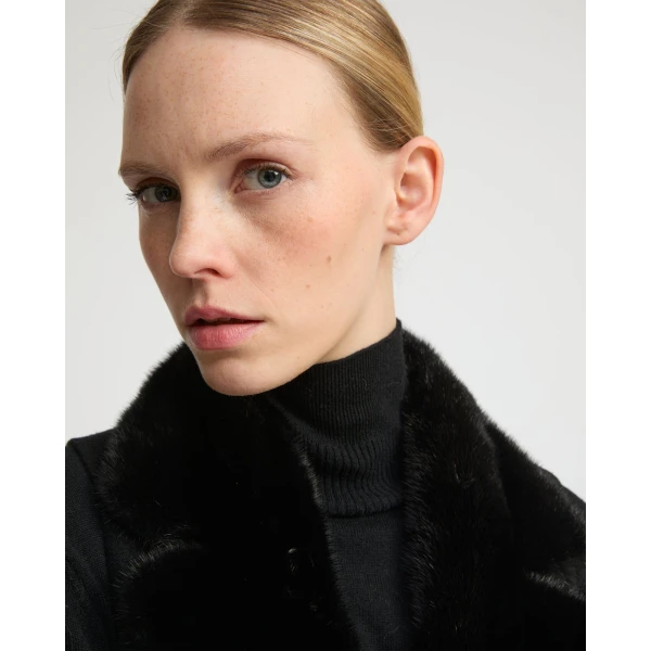 Woman wearing Yves Salomon shearling fur coat – luxury outerwear at Luxury Shoes 