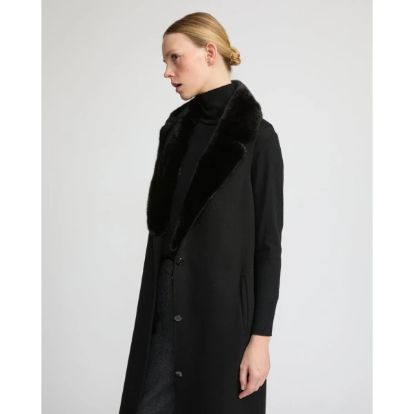 Woman wearing Yves Salomon shearling fur coat – luxury outerwear at Luxury Shoes 