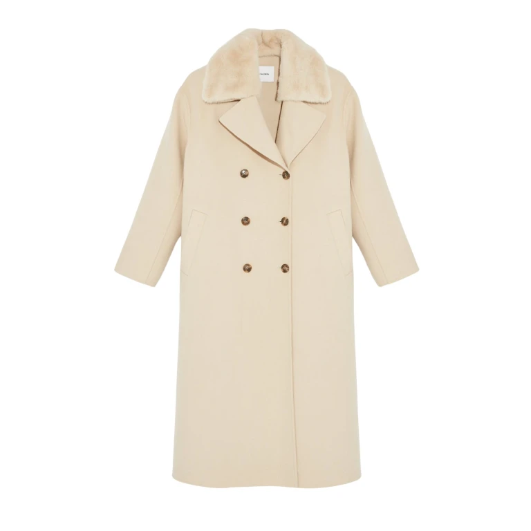 Woman wearing Yves Salomon shearling fur coat – luxury outerwear at Luxury Shoes 