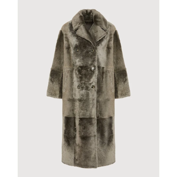 Woman wearing Yves Salomon shearling fur coat – luxury outerwear at Luxury Shoes 
