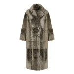 Woman wearing Yves Salomon shearling fur coat – luxury outerwear at Luxury Shoes 
