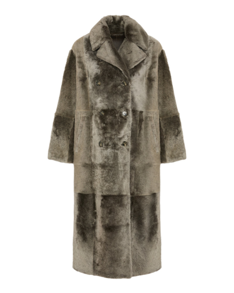 Woman wearing Yves Salomon shearling fur coat – luxury outerwear at Luxury Shoes 