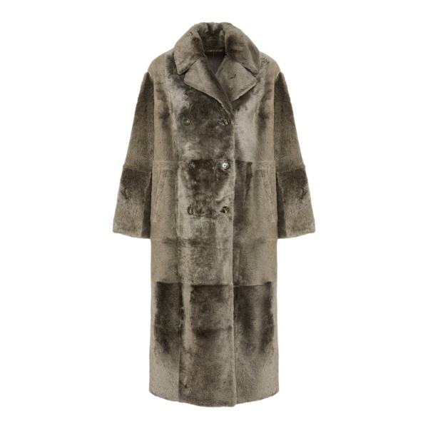 Woman wearing Yves Salomon shearling fur coat – luxury outerwear at Luxury Shoes 