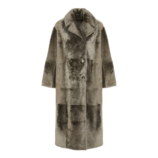 Woman wearing Yves Salomon shearling fur coat – luxury outerwear at Luxury Shoes 