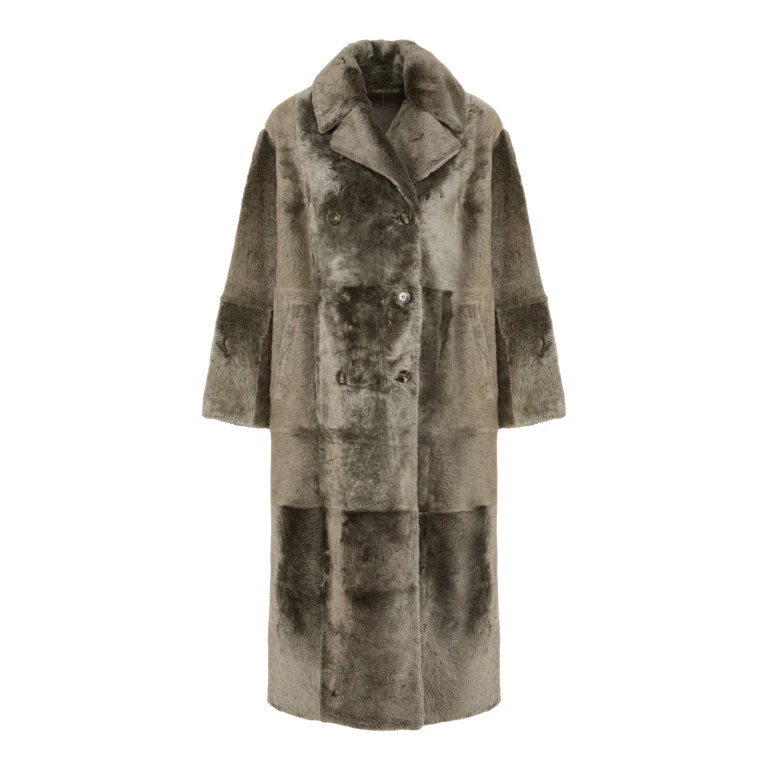 Woman wearing Yves Salomon shearling fur coat – luxury outerwear at Luxury Shoes 
