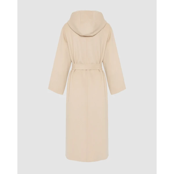 Woman wearing Yves Salomon shearling fur coat – luxury outerwear at Luxury Shoes 