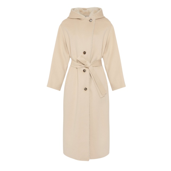 Woman wearing Yves Salomon shearling fur coat – luxury outerwear at Luxury Shoes 