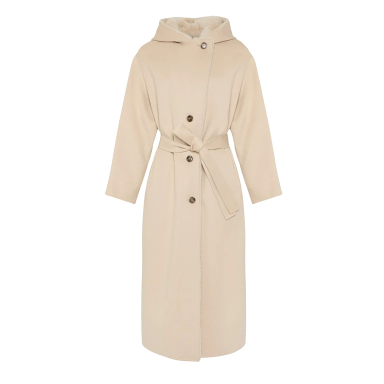 Woman wearing Yves Salomon shearling fur coat – luxury outerwear at Luxury Shoes 