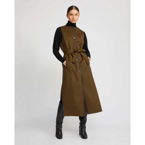 Woman wearing Yves Salomon shearling fur coat – luxury outerwear at Luxury Shoes 