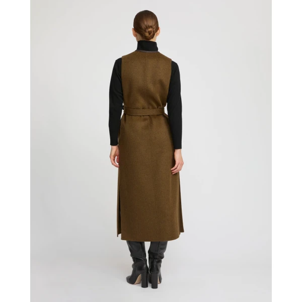 Woman wearing Yves Salomon shearling fur coat – luxury outerwear at Luxury Shoes 