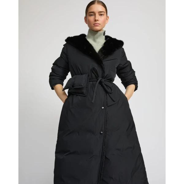 Woman wearing Yves Salomon shearling fur coat – luxury outerwear at Luxury Shoes 