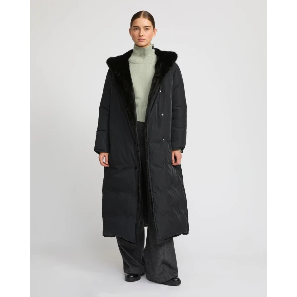 Woman wearing Yves Salomon shearling fur coat – luxury outerwear at Luxury Shoes 