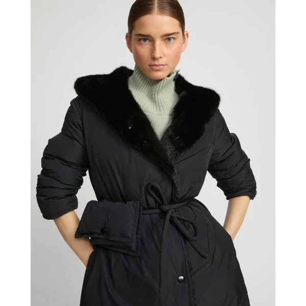 Woman wearing Yves Salomon shearling fur coat – luxury outerwear at Luxury Shoes 