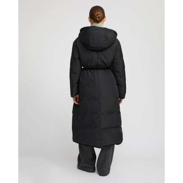 Woman wearing Yves Salomon shearling fur coat – luxury outerwear at Luxury Shoes 