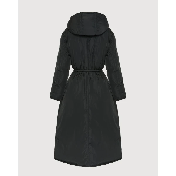 Woman wearing Yves Salomon shearling fur coat – luxury outerwear at Luxury Shoes 
