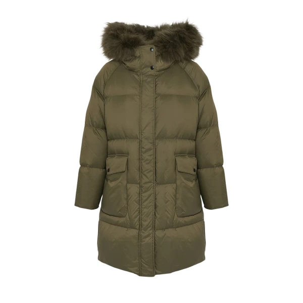 Woman wearing Yves Salomon shearling fur coat – luxury outerwear at Luxury Shoes 