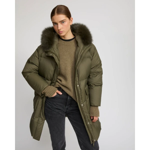 Woman wearing Yves Salomon shearling fur coat – luxury outerwear at Luxury Shoes 