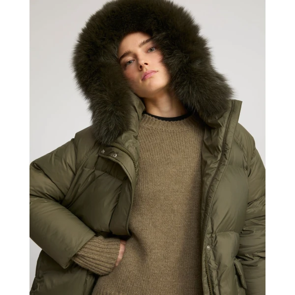 Woman wearing Yves Salomon shearling fur coat – luxury outerwear at Luxury Shoes 