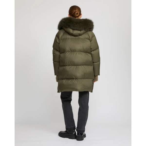 Woman wearing Yves Salomon shearling fur coat – luxury outerwear at Luxury Shoes 