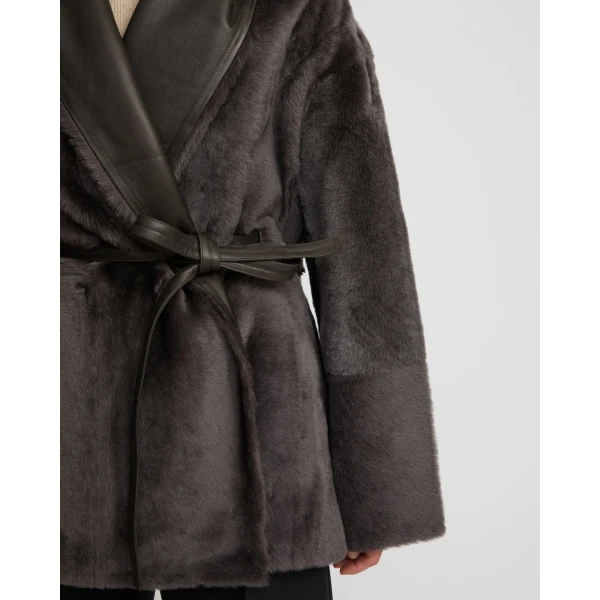 Woman wearing Yves Salomon shearling fur coat – luxury outerwear at Luxury Shoes 