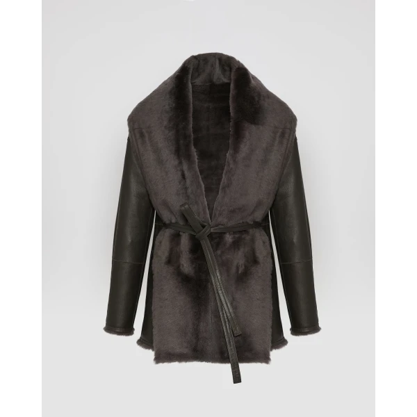 Woman wearing Yves Salomon shearling fur coat – luxury outerwear at Luxury Shoes 
