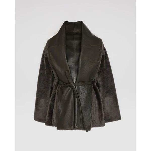 Woman wearing Yves Salomon shearling fur coat – luxury outerwear at Luxury Shoes 