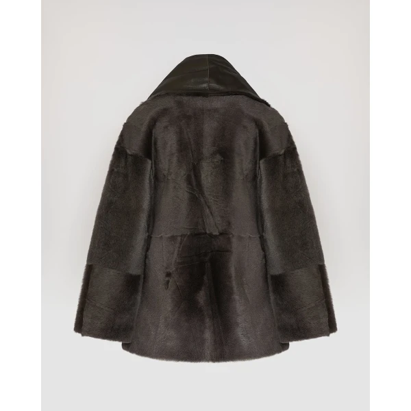 Woman wearing Yves Salomon shearling fur coat – luxury outerwear at Luxury Shoes 