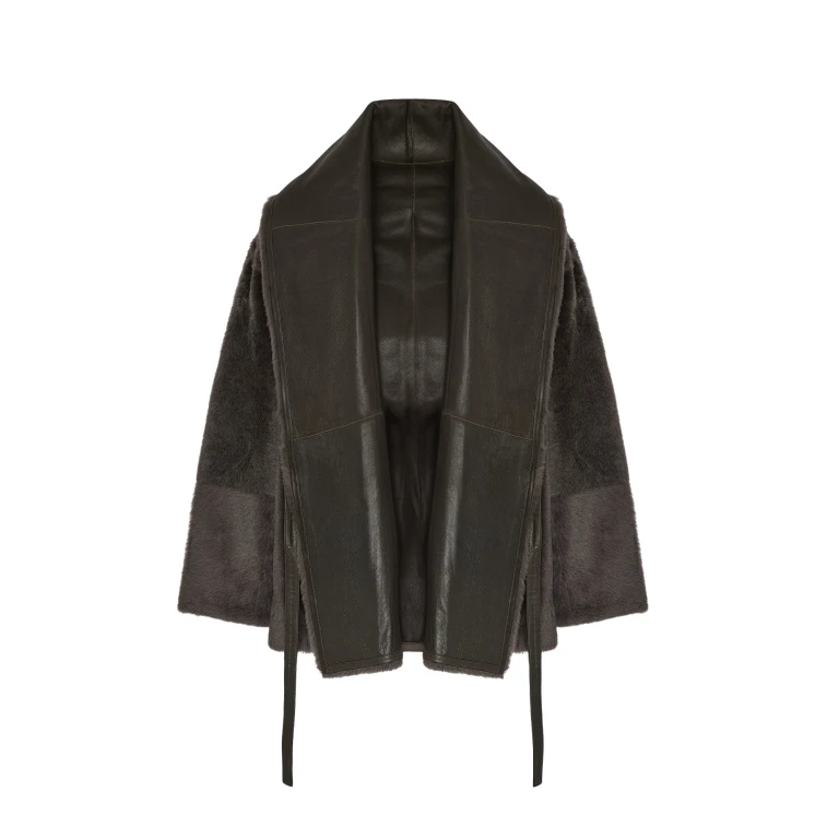 Woman wearing Yves Salomon shearling fur coat – luxury outerwear at Luxury Shoes 